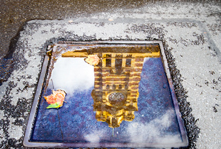 Flinders Street Station reflected.