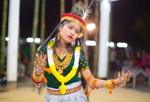 A girl dances the Leisem Jagoi (dance of devotion), at the Thangjing Lai Haraoba festival of Moirang. Byron Aihara