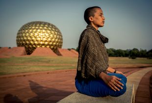 Auroville: Kanika Meditating At The Matrimandir