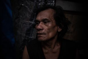 Into The Dark: Scenes From South East Asia's Meth Epidemic. An addict in his home in a slum, Manila, Philippines.