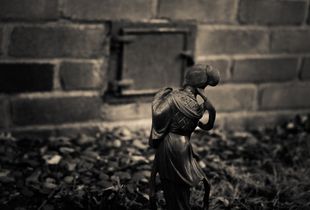 Atsuko waits for the remains of her grandfather at the crematorium.