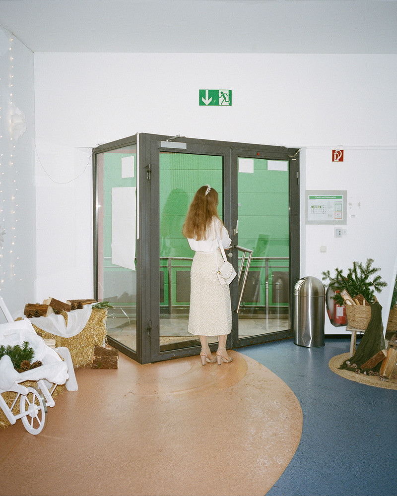 Untitled. On the outskirts of Frankfurt, an industrial area transforms every Sunday as diverse faith communities find solace in affordable, quiet spaces. Hidden within plain warehouses, independent churches and cultural associations thrive, hosting prayers, weddings, and gatherings. Surrounded by office buildings, repair shops and one of Germany's largest meat producing factories, these small communities remain unnoticed by much of the city. In contrast to prominent institutionalized churches, they quietly foster connection and tradition among themselves. © Josefine Rauch