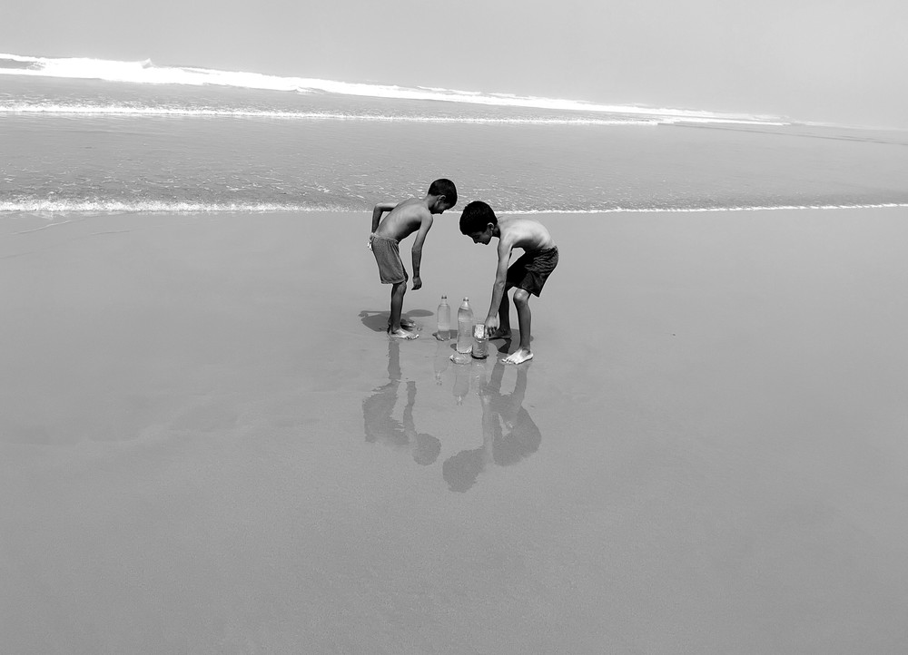 DEEP REFLECTIONS ON THE BEACH