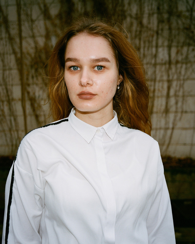 Snezhana. On the outskirts of Frankfurt, an industrial area transforms every Sunday as diverse faith communities find solace in affordable, quiet spaces. Hidden within plain warehouses, independent churches and cultural associations thrive, hosting prayers, weddings, and gatherings. Surrounded by office buildings, repair shops and one of Germany's largest meat producing factories, these small communities remain unnoticed by much of the city. In contrast to prominent institutionalized churches, they quietly foster connection and tradition among themselves. © Josefine Rauch