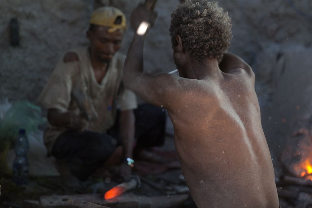 Men at The Forge Work