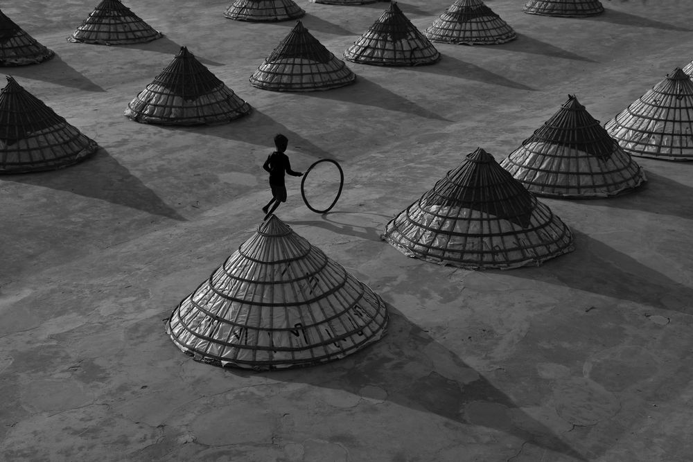 Boy in Paddy Drying Yard