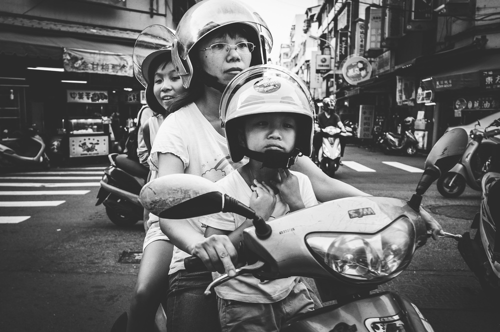Child sitting on the motorcycle