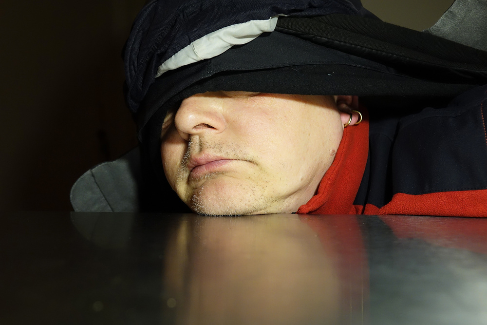 self portrait hooded, with climate change on stainless steel
