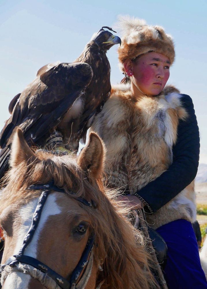 An eagle huntress in a man's country.