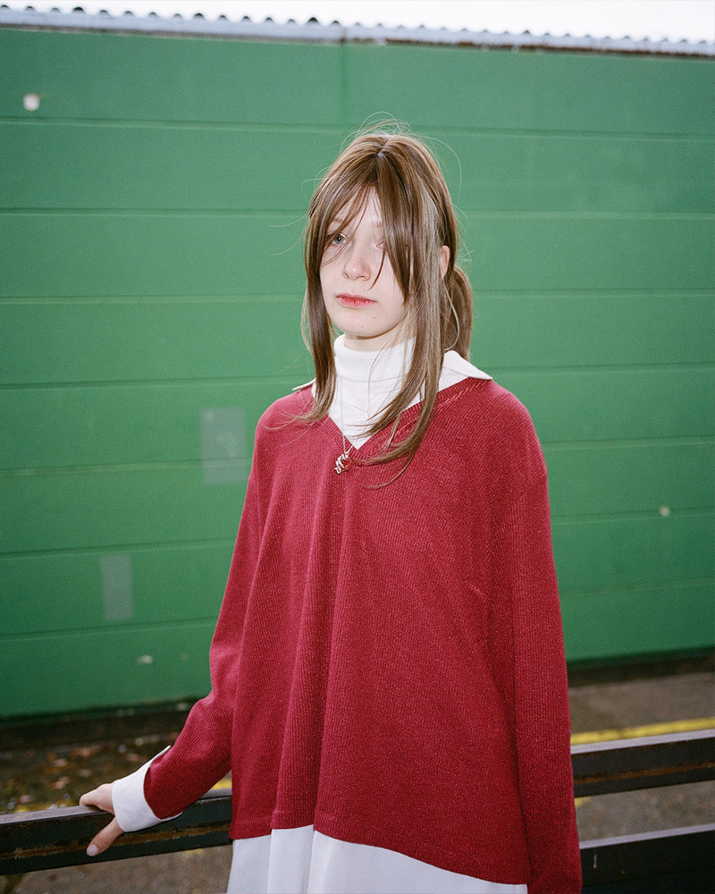 Angelina. On the outskirts of Frankfurt, an industrial area transforms every Sunday as diverse faith communities find solace in affordable, quiet spaces. Hidden within plain warehouses, independent churches and cultural associations thrive, hosting prayers, weddings, and gatherings. Surrounded by office buildings, repair shops and one of Germany's largest meat producing factories, these small communities remain unnoticed by much of the city. In contrast to prominent institutionalized churches, they quietly foster connection and tradition among themselves. © Josefine Rauch