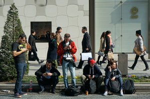 group of five foreign travelers  including an only woman