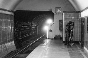 'A Snuggle as a Train Approaches'