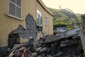 The totally collapsed house where Ciro and his two little brothers were rescued.