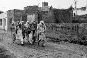 Women going to a mourning  | Dhanda, Punjab.