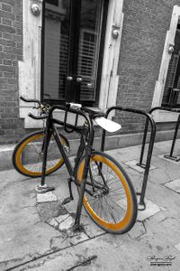 Gold Rimmed Bicycle in Soho, London