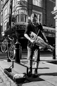 Man playing a nyckelharpa,  Covent Garden, London