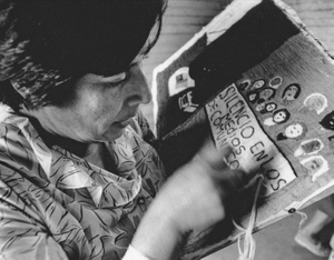 Woman relative of political prisoner making patchworks to sell to make ends meet during the Pinochet years. Concepcion, Chile, 1986