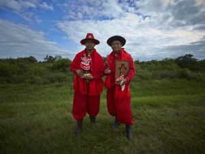 Gauchito Gil devotees gathering in Mercedes town for the celebrations of January 8, date of the murder of the popular saint, dressed up in the typical red colour costumes
