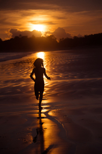 My son running after the sun