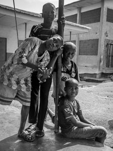 Children in front of their school during a break.