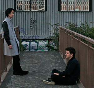 Boys On A Bridge At Dusk.