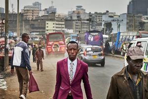 Residents of Nairobi return home from work in the evening. Colourful competitiveness and the thrive for progress seem to part of the DNA of Nairobiës inhabitants. Techies and reformers are working on digitalising the fares for Matatus and on electrifying their engines. Perhaps soon electric-buses will be whizzing through Nairobi, making the colourful Matatus more eco-friendly in the future.