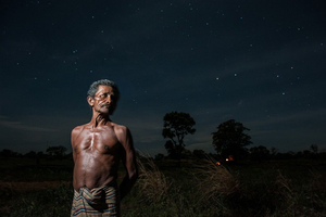 Palgedara Herata Banda is a farmer who works in an onion farm during the night in Sigirya, Sri Lanka.