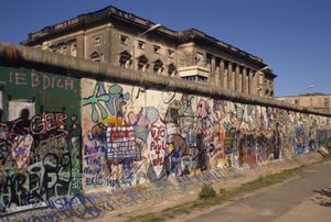 The Berlin Wall Jonathan Borosky runninng man