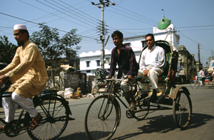 Rickshaw with passenger, Chittagong, Bangladesh
