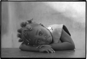 Nap time, Freetown, Sierra Leone            © Betty Press