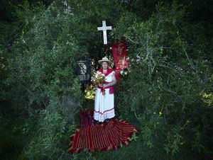 Gauchito Gil devotee in a popoular saint aedicule in the El Yaguarì estancia in Curuzù Cuatià village