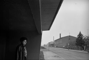 Woman in Bus Shelter