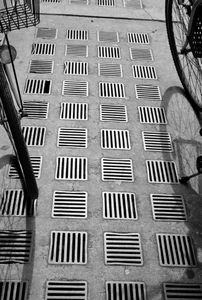 sidewalk with bikes