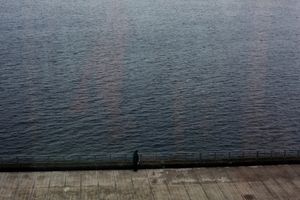 A woman outside of a huge shopping complex in Puerto Montt, the entrance to the chilean Patagonia.