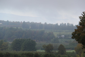 Early autumn mist rising in Vermont's  agricultural Addison County.