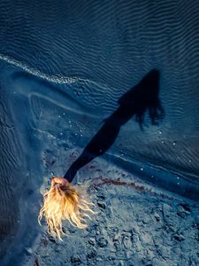 Above a Woman's Shadow