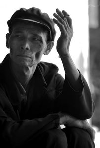 The Dazang, or spiritual leader of the Bulang community at Laomange on Bulangshan. © Michael Freeman
