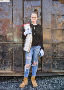 Girl With Scrap Metal