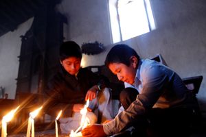 Boys with candles