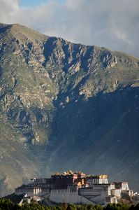 The Potala Palace in Lhasa is the second most holy place to Tibetan Buddhists. It was the winter home of the Dalai Lama. It is seen here from the far side of the Lhasa River, photographed on 29 June 2005. © Forest McMullin