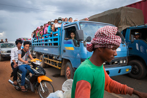 A truck fully loaded transports garment factory workers at the end of their shift. Cambodia’s garment sector employs more than 650,000 people. Most of them are women.