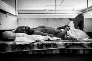 An immigrant at Safi detention center. The journey to Malta is long and exhausting, they arrive in Libya crammed onto pick-ups, where they are usually imprisoned for months, from where, with makeshift boats they will try to reach Europe.