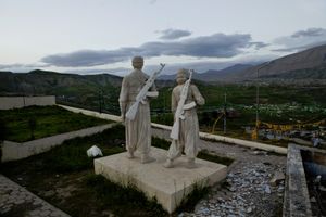 Statues of a male and female peshmerga partisan. Peshmerga  is the term used by Kurds to refer to armed Kurdish fighters. Literally meaning "those who confront death", the Peshmerga forces of Kurdistan have been in existence since the advent of the Kurdish independence movement in the early 1920s. © Tom Verbruggen