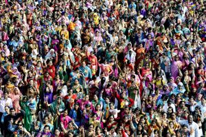 Triumphant vaccinators and polio volunteers gather to celebrate the eradication of polio in India in Ghaziabad, Uttar Pradesh