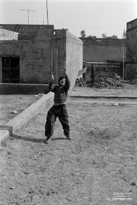 Boy trying to fly a kite | Dhanda, Punjab.