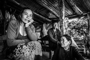 A family who lost their home during the earthquake of April 2015. Now they are living in a temporary shelter which they managed to rebuild using materials from the remains of their destroyed home.