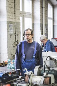 In the metal workshop.