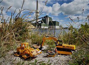 Machines cleaning the town beach