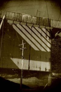 It is a telephone pole on the wall