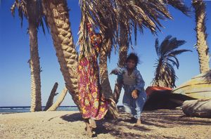 "Bedouin Girls Swinging Palms in Dahab"